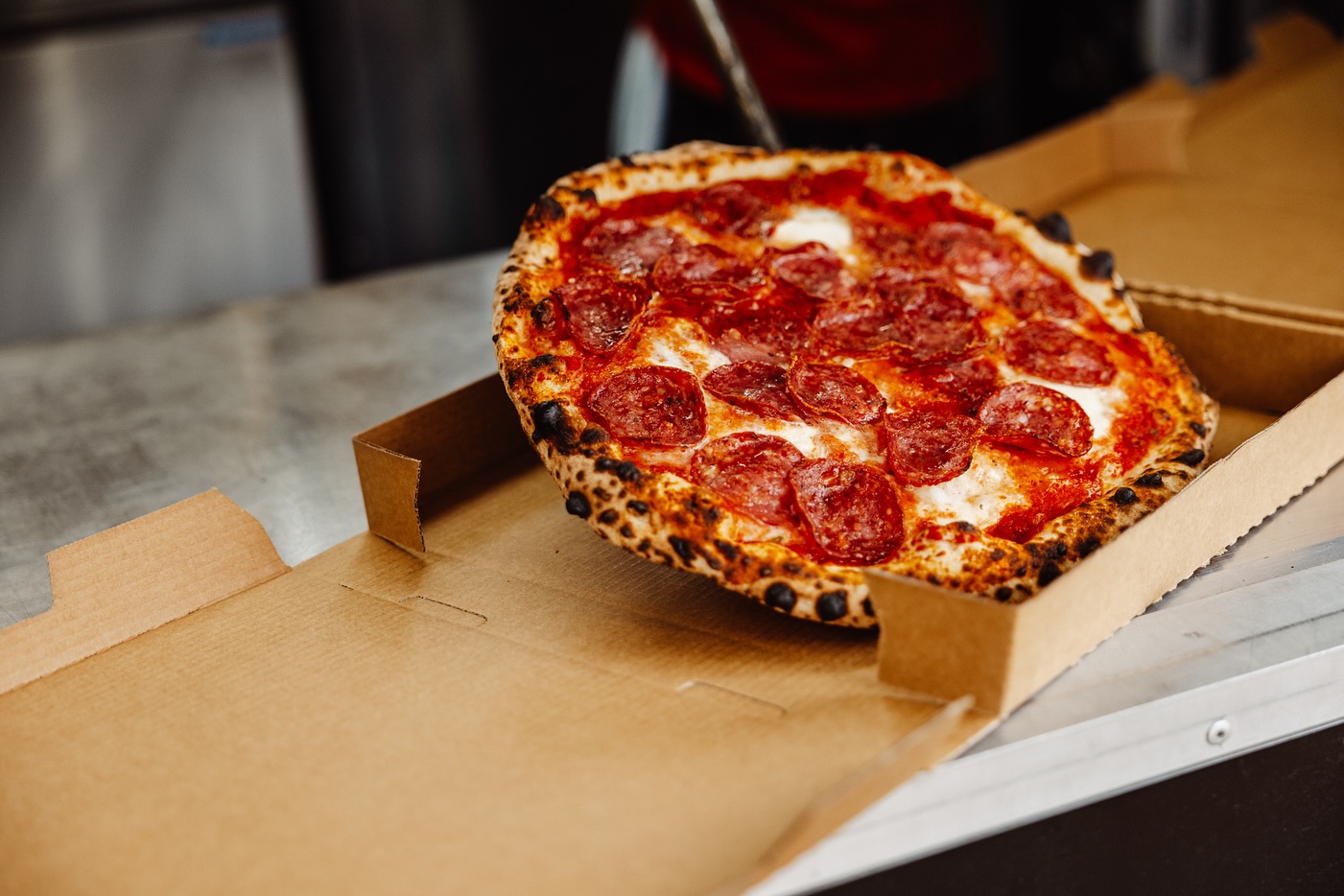 Woodfired salami pizza ready to serve
