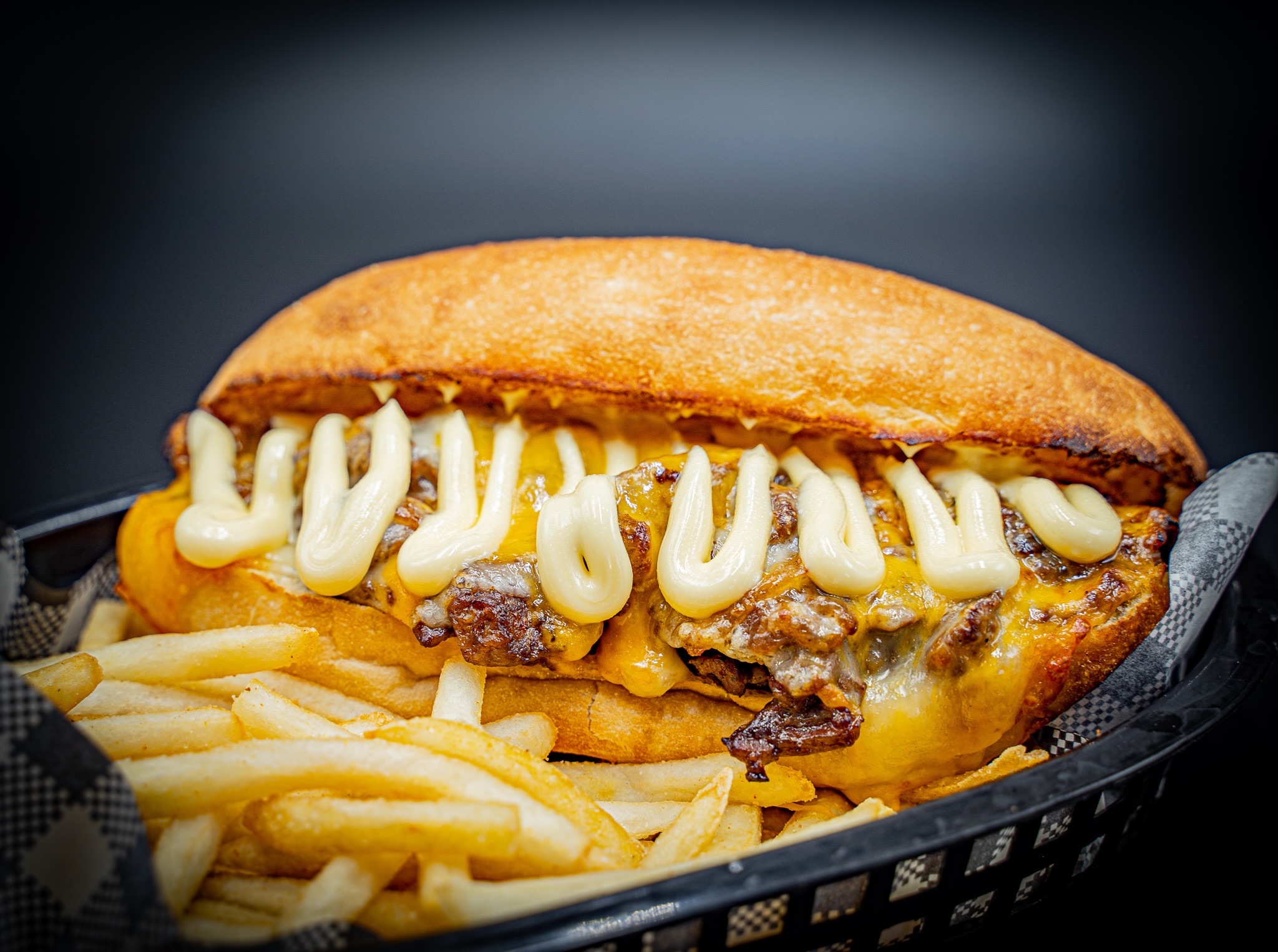 Cheesesteak with melted cheese and sauce